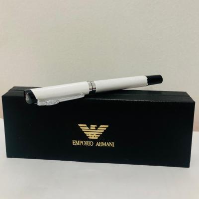 An Emporio Armani style ball point pen, 5½" long Barnebys