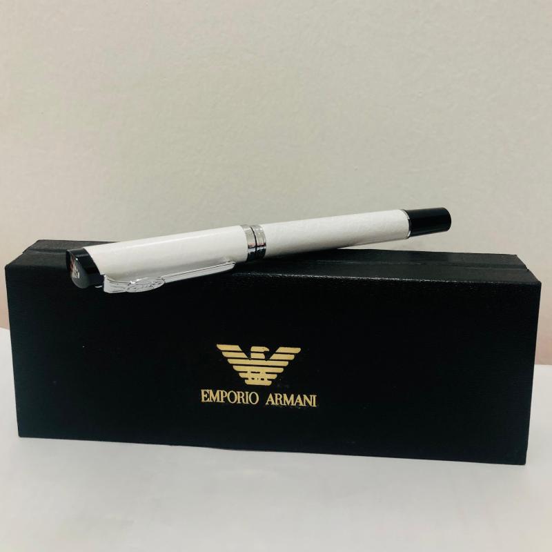 An Emporio Armani style ball point pen, 5½" long Barnebys
