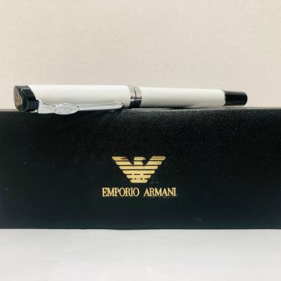 An Emporio Armani style ball point pen, 5½" long Barnebys